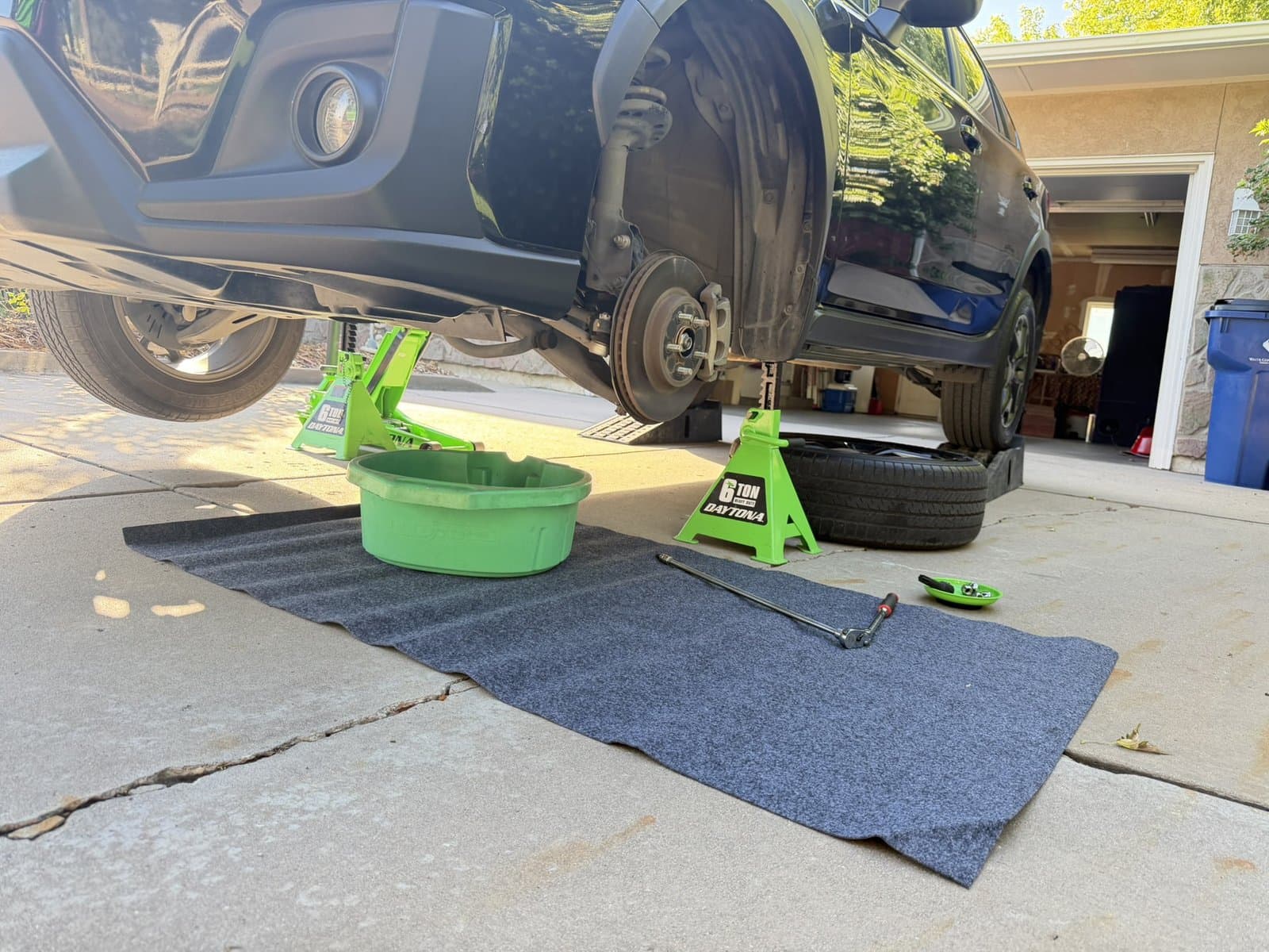 Reliable Lube Co. mobile oil change on a customer SUV in the driveway